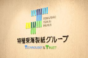 Tokushu Tokai Paper signboard and logo